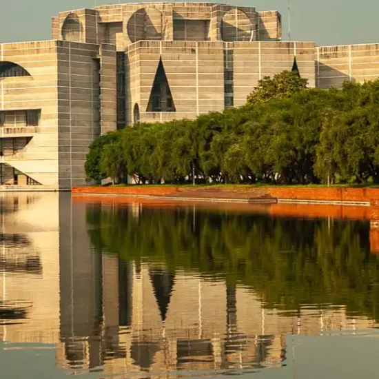 View of Bangladesh Parliament Building through the crescent lake
