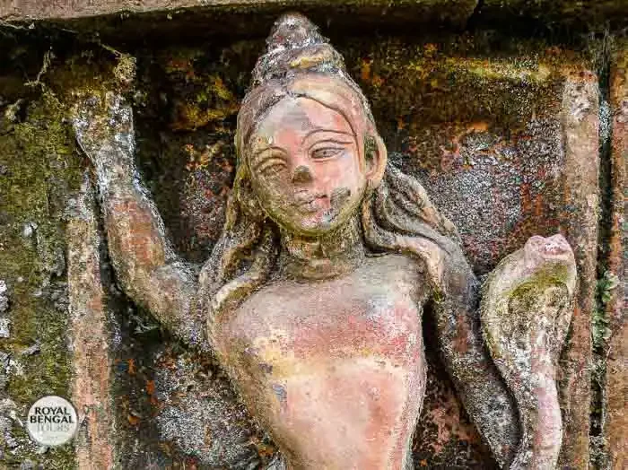 a terracotta plaque depicting Buddhist deities on the walls of Somapura Mahavihara Buddhist monastery