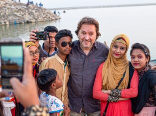 Taking picture with local’s in Bangladesh