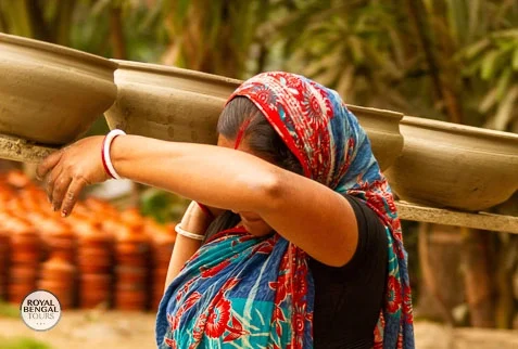 tourists can learn pottery making techniques from a Bangladeshi family during a village homestay