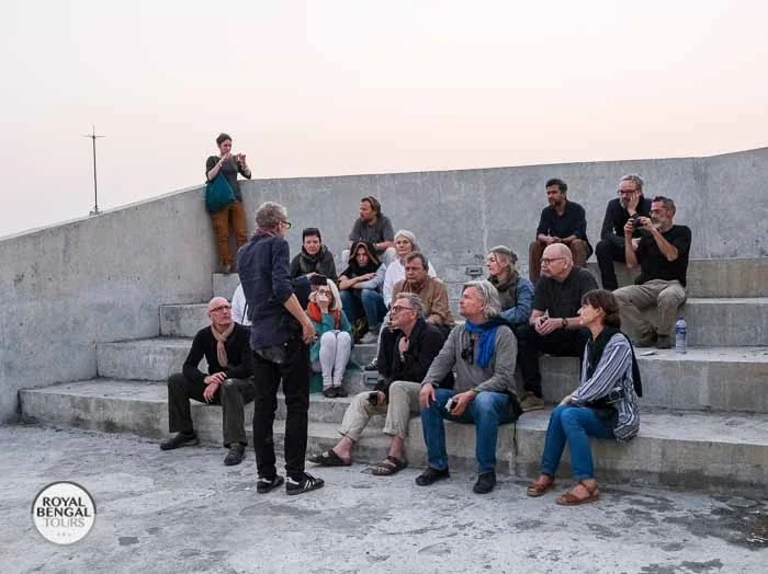 Group visiting a cyclone shelter on a Royal Bengal Tours backwater cruise in Barisal, Bangladesh.