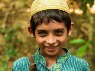 Smiling portrait of a boy in Bangladesh