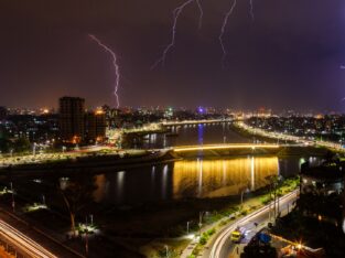 Nightlife of dhaka with thunder bolt spark in the sky