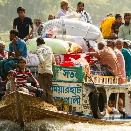 a small boat full of passengers in Bangladesh
