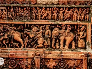 ancient battle scene on the terracotta plaques of Kantaji temple