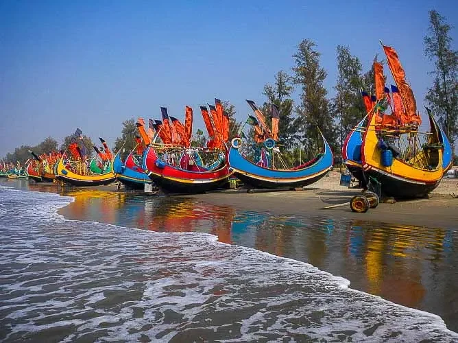 extreme colourful wooden fishing boats on coxs bazar sea beach
