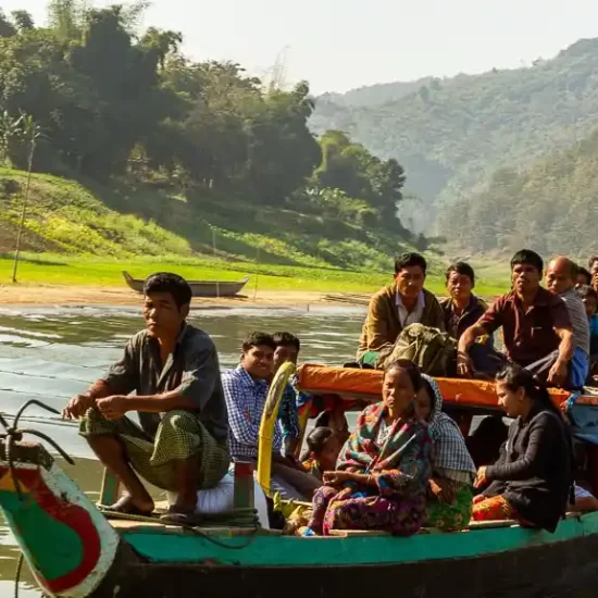 tribal people travel a long distance by boat in chittagong