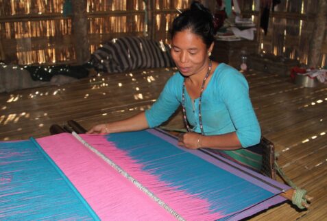 Tripura tribal lady weaving her own dress in Chittagong Hill tra