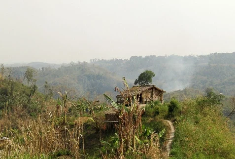 A Jhum house nestled amidst the hills of Chittagong Hill Tracts