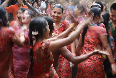 Beautiful Rakhain girls in colorful dress during the water festi