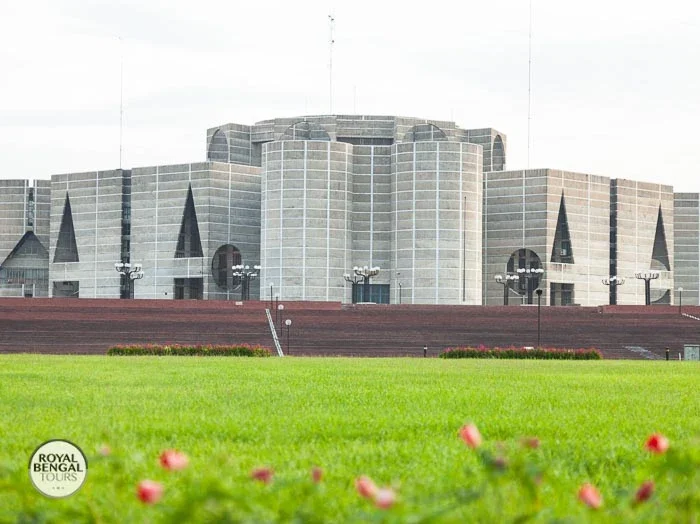 Bangladesh National Parliament House with a large green field in front