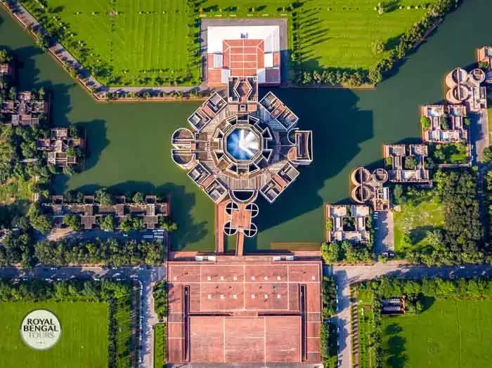 Aerial view of National Parliament House in Dhaka with circular layout and water bodies