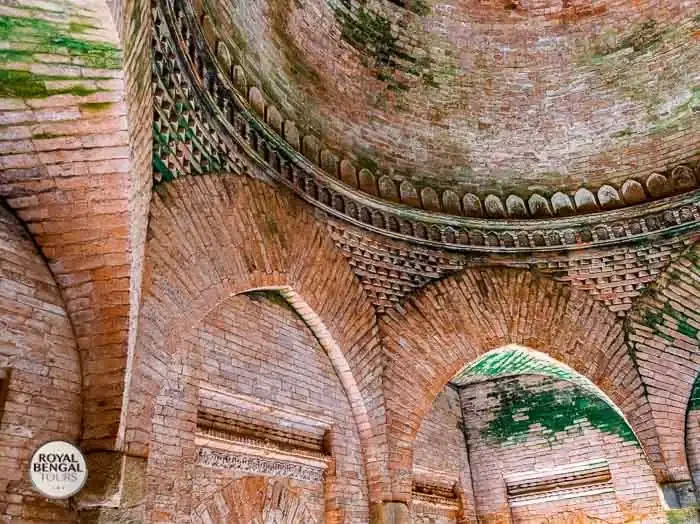 perfect roundesh dome of goaldi mosque stands on brick pillars